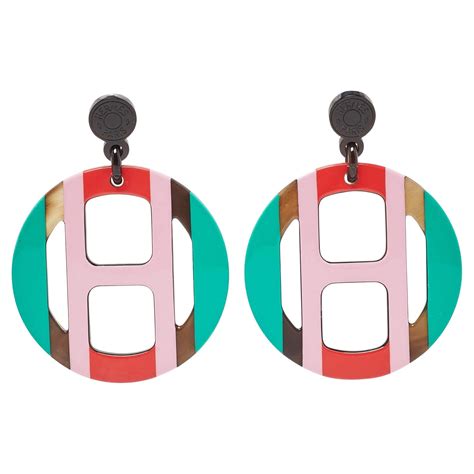 hermes horn and lacquer earrings.